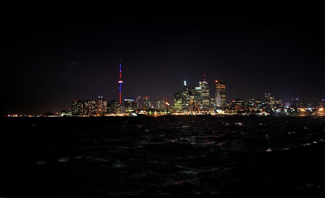 Skyscrapers beautifully lit up against the night sky