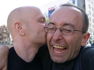 John giving Ulli a surprise kiss on the cheek