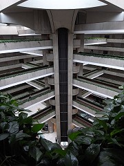 Lots of symmetrical concrete walkings sprouting from a central set of lifts.