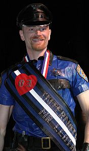 John in winner's sash, May 2003