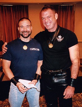 Jason Hendrix standing next to Michael Egdes, both wearing their IML medals