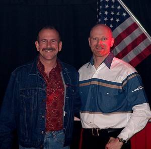 John standing next to Larry Everett