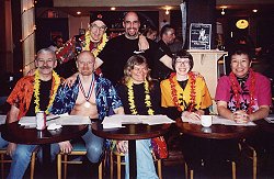 The Ms Ottawa-Outaouais contest judges, all wearing Hawaiian print shirts and garlands of flowers