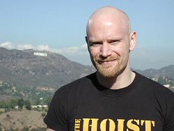 John in Los Angeles with the Hollywood sign behind him