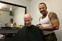 Joe Gallagher (IML 1996) cutting John's hair