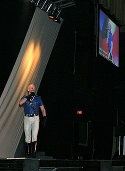 Photo of John giving his step-down speech, May 2004