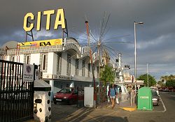 Bright CITA Center sign against a grey sky